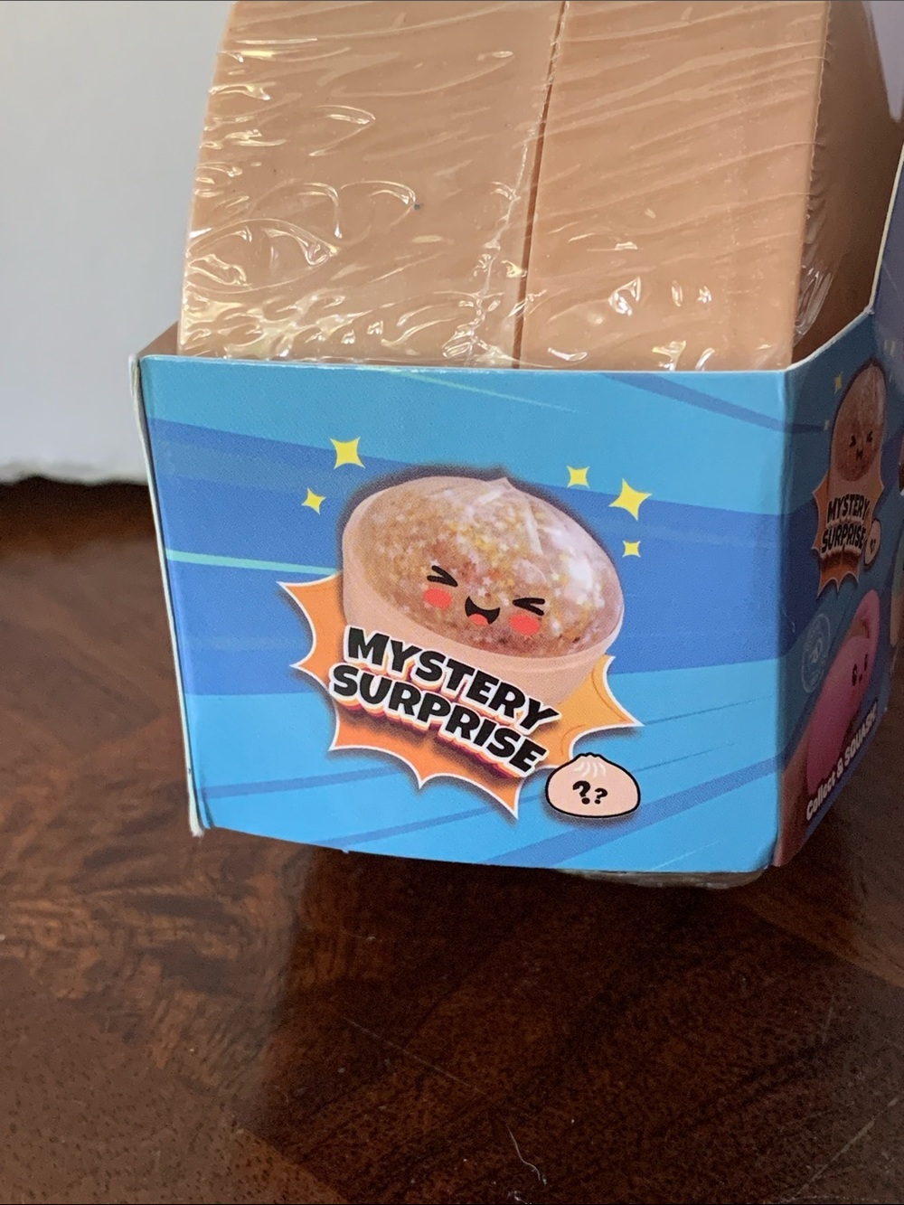 Mystery Squashy Dumplings Kids Toy - Tan Steamer Pot with Blue Packaging - Picture 4 of 4